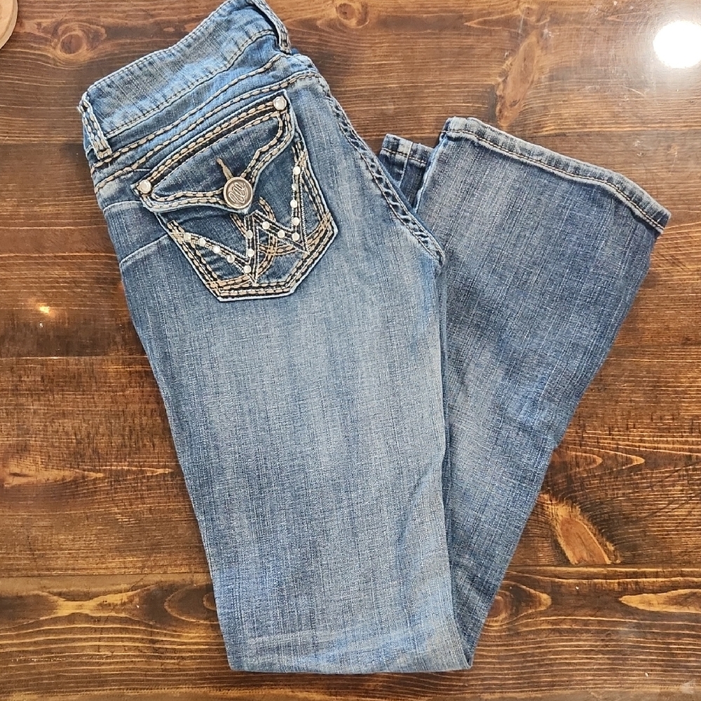 Blue Boot Cut Jeans with Distressed Look